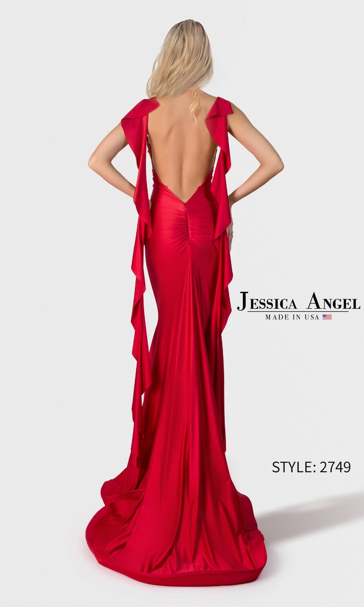 A woman with long blonde hair wears the Long Prom Dress: Jessica Angel 2749, a red backless floor-length stretch satin gown with ruffled straps.